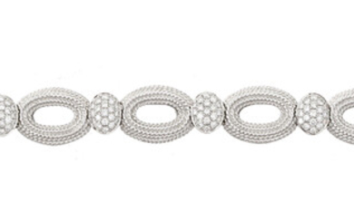 Bracelet en or gris 750 composé de maillons ovales à motif de cordage alternés d'éléments sertis de diamants taille brillant