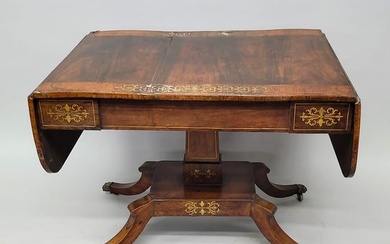 Circa 1820's English Regency Brass Inlaid Table. Drop leaves & drawer. Has orginal casters & brass
