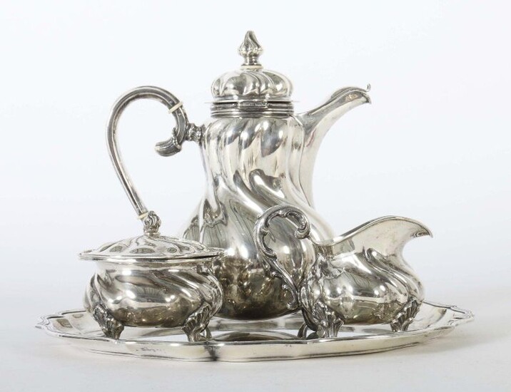 Coffee core on tray in baroque style, various manufactures, Germany, 20th century, silver 800, approx. 2062 g, 4 pcs. consisting of coffee pot, cream jug, sugar bowl and round tray, bellied corpi with curved folds, each supported by 4 short concave...