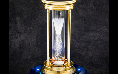 DE BEERS. A BRASS AND DIAMOND HOUR GLASS TIMER