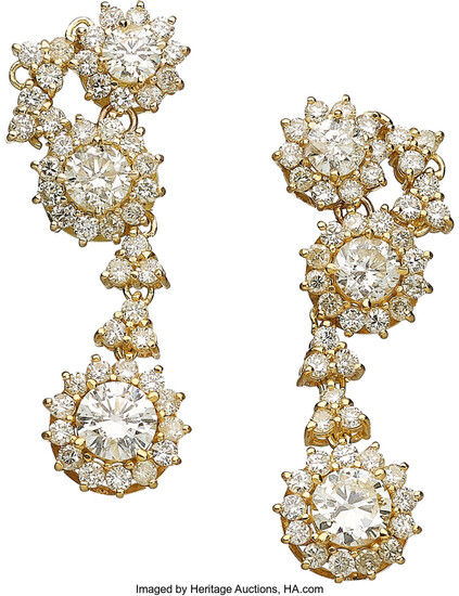 Diamond, Gold Earrings The drop earrings feature full-cut diamonds...
