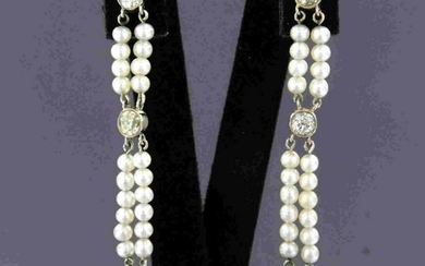 Diamond earrings with pearls