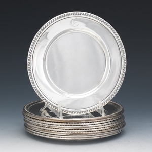 Eight Mueck-Carey Sterling Silver Bread Plates