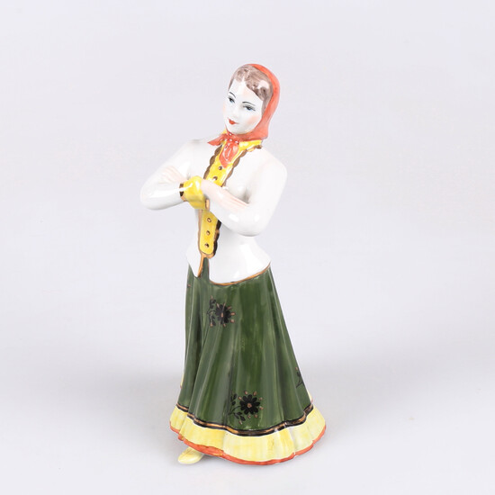 FIGURE in porcelain, girl with arms crossed, 1950s, Russia.
