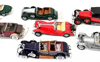 FRANKLIN MINT PRECISION MODELS; seven boxed display model cars comprising...