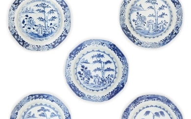 Five Chinese export blue and white plates, 18th century, four pieces similarly decorated with bamboo and peony among rocks, the other one painted with a willow tree within a garden setting, 23.5cm diameter. (5) 清十八世紀 青花外銷瓷盤五件