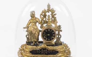 Gilded mantel clock under bell jar depicting an elegant lady, marked on the dial Brunnee à Tarare