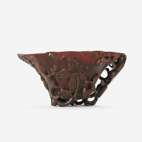 A Chinese Carved Rhinoceros Horn Libation Cup
