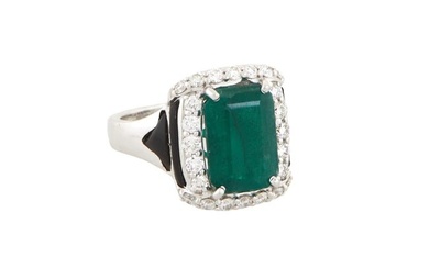Lady's Platinum Emerald and Diamond Dinner Ring, with an octagonal 4.13 carat emerald atop a