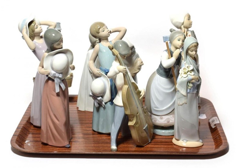 Lladro figures of women and girls, and a boy playing...