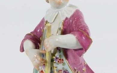 Meissen signed porcelain figure with pink coat