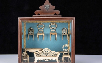 Nine pieces of 19th century fretwork dolls’ house furniture
