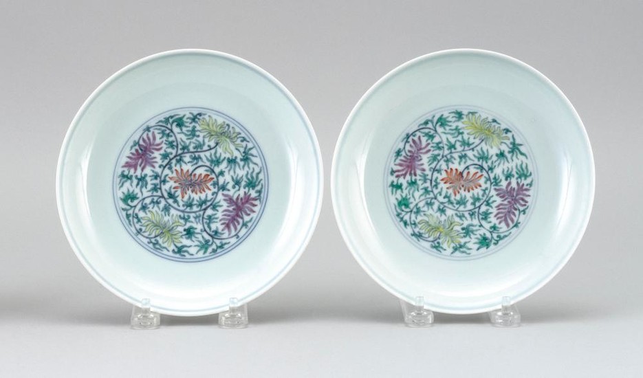 PAIR OF CHINESE DOUCAI PORCELAIN DISHES With a flower and vine design. Six-character Daoguang mark on base. Diameters 6.9".