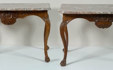 Pair of carved oak Regency style consoles surmounted...