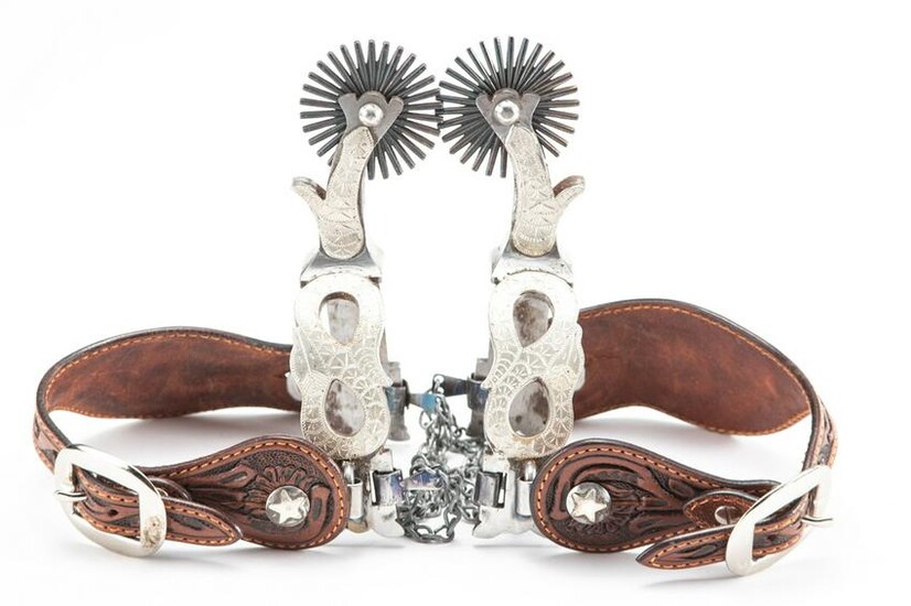 Pair of sterling mounted, hand engraved Spurs by noted