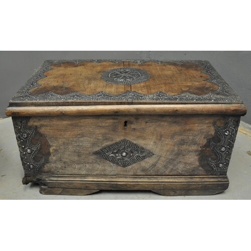 Plain West African wooden trunk with applied repousse white ...