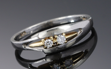 Platinum diamond ring with gold detail and diamonds, 0.06 ct.