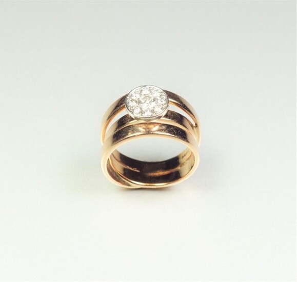 Ring formed of three smooth flat interlocking rings in two-tone...