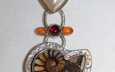 Sterling silver fossilized ammonite amber rhodolite garnet MOP pendant