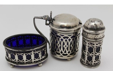 THREE SILVER CONDIMENTS with blue glass liners, comprising a...