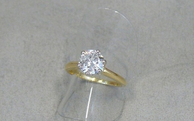 A solitaire ring in yellow gold (eagle), set in the...