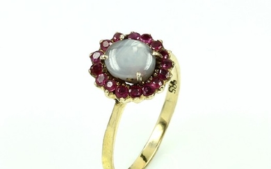 14 kt gold ring with star sapphire...
