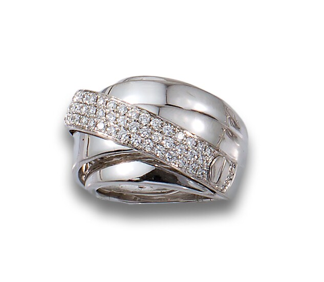 18kt white gold bombé ring with brilliant-cut diamonds.