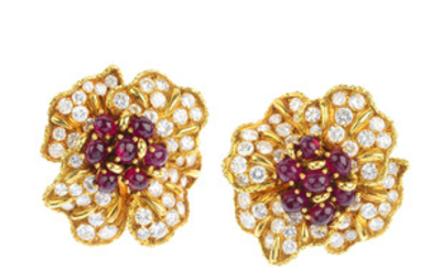 A pair of mid 20th century, 1970s, ruby and diamond floral earrings. View more details