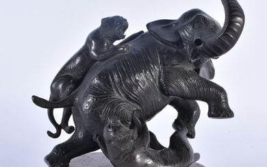 A 19TH CENTURY JAPANESE MEIJI PERIOD BRONZE OKIMONO modelled as an elephant being attacked by tigers