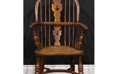 A 19th century yew and elm child’s Windsor elbow chair, low ...