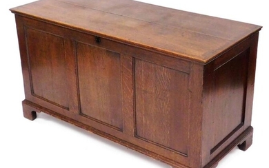 A 19thC oak blanket chest, with a triple panelled...