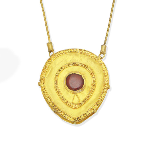 A 20th century Scythian style garnet pendant