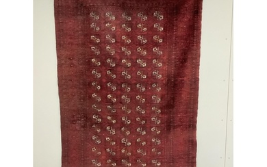 A Bokhara red ground carpet, 240 x 156cm