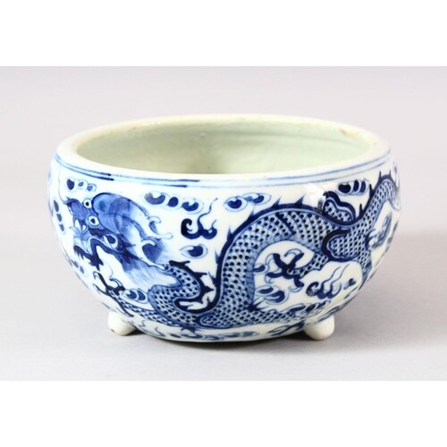 A CHINESE BLUE & WHITE PORCELAIN DRAGON BRUSH POT - with tri...