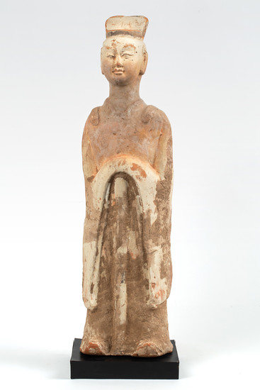 A CHINESE TERRACOTTA FIGURE OF A WARRIOR, HAN DYNASTY (206 BC-220 BCE)