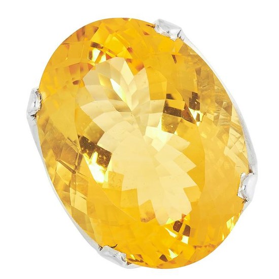 A CITRINE DRESS RING set with a large oval cut citrine