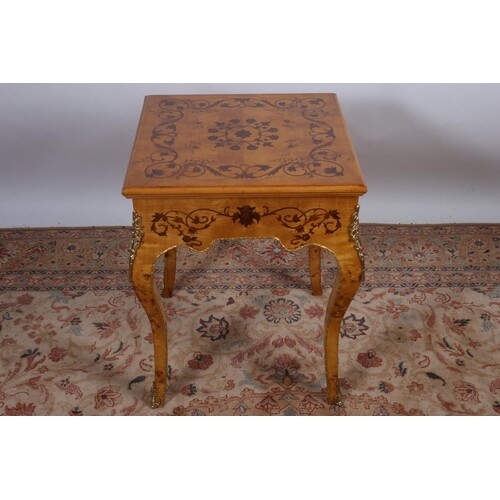 A CONTINENTAL WALNUT INLAID GAMES TABLE the rectangular outl...
