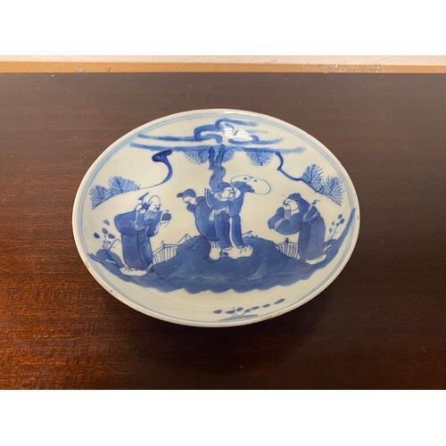 A Chinese blue and white dish, painted with figures, four ch...