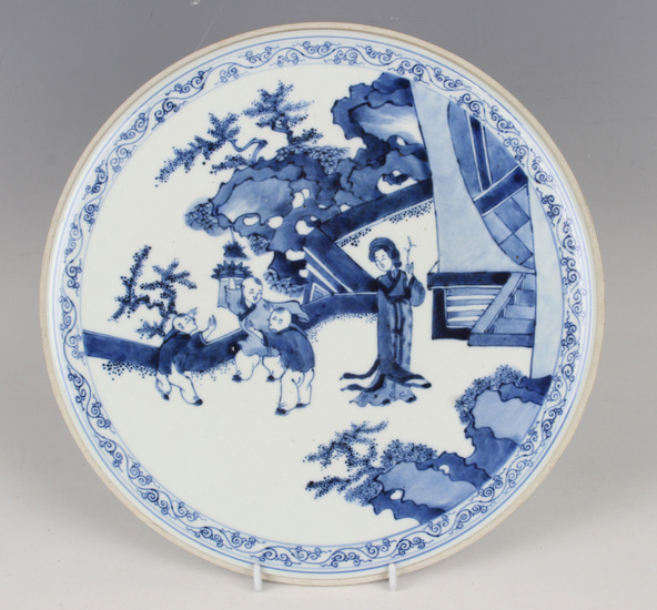 A Chinese blue and white porcelain circular panel, probably late Qing dynasty or later, painted with