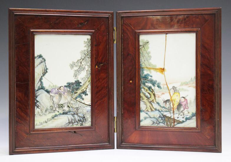 A Chinese hardwood and famille rose porcelain two-fold screen, early 20th century, each rectangular
