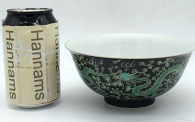 A Chinese porcelain Famille Noire Dragon bowl 7.5 x 16 cm.