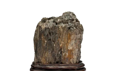 A Chinese scholar's rock 20th century Made from a piece of petrified...
