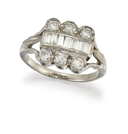 A DIAMOND DRESS RING Centred by a channel-set row of