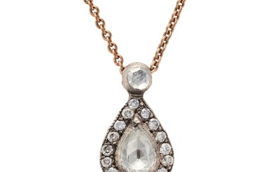 A DIAMOND PENDANT NECKLACE the pendant set with a pear shaped rose cut diamond in a border of round