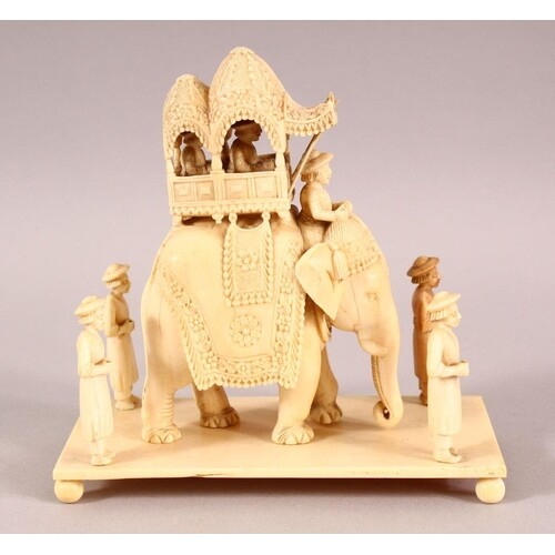 A FINE 19TH CENTURY INDIAN CARVED IVORY ELEPHANT GROUP, the ...