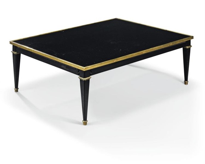 A French black lacquer and brass mounted low centre table, of recent manufacture, in the manner of Maison Jansen