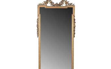 A GILTWOOD AND GESSO WALL MIRROR, 20TH CENTURY, the shaped...