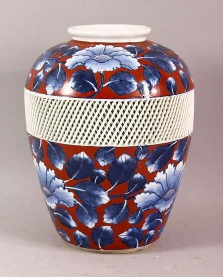 A JAPANESE BLUE AND RED PORCELAIN VASE, the body with a