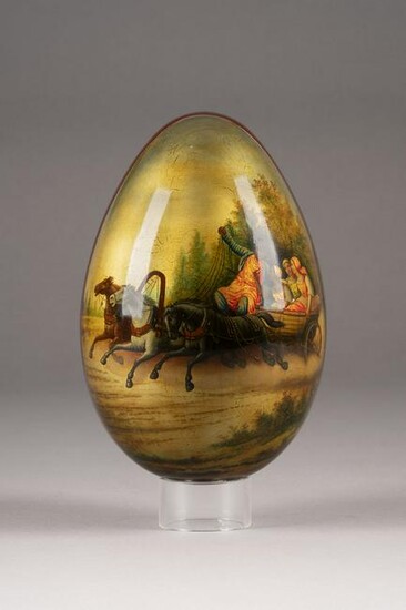A LARGE PAPIERMACHÃ‰ AND LACQUER EASTER EGG SHOWING A
