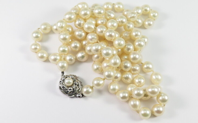 A LONG CULTURED PEARL NECKLACE